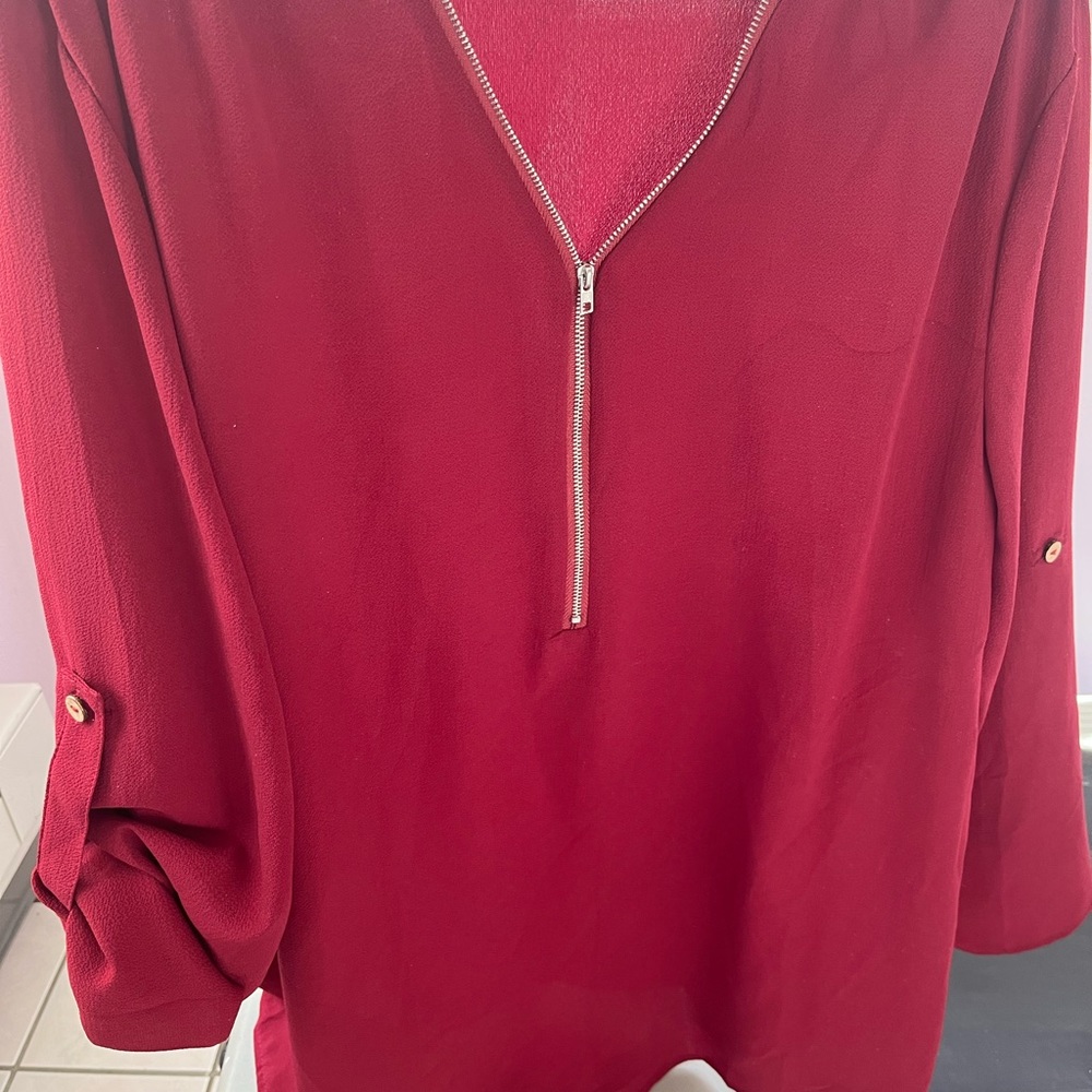 Woman’s oversized XL crepe blouse burgundy color. Long. Never worn.